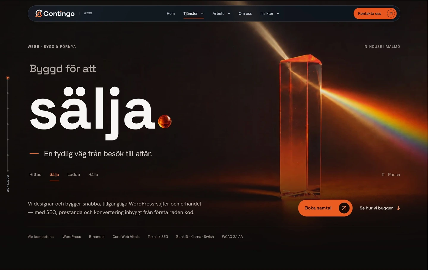 Sidan om Webb: den mörka öppningen med orange prisma och rubriken Byggd för att sälja.